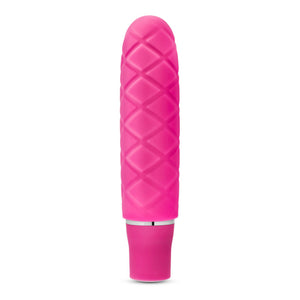 Side view of the blush Luxe Cozi Mini Faschia Vibrator, standing up on its base.