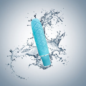 blush Luxe Cozi Mini Vibrator, with a water splash in the background, indicating the product is waterproof.