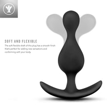Load image into Gallery viewer, On the top left is an icon for Soft and Flexible: The soft flexible shaft of this plug has a smooth finish that&#39;s perfect for adding new sensations and conforming with your body. On the right side of the image is the side view of the black variant of the product with the shaft showing that its bent in separate directions, demonstrating the flexibility of the product.