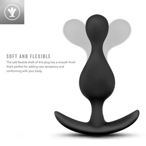 On the top left is an icon for Soft and Flexible: The soft flexible shaft of this plug has a smooth finish that's perfect for adding new sensations and conforming with your body. On the right side of the image is the side view of the black variant of the product with the shaft showing that its bent in separate directions, demonstrating the flexibility of the product.