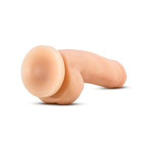 Back side view of the blush Coverboy Mr. Fix It Realistic Dildo