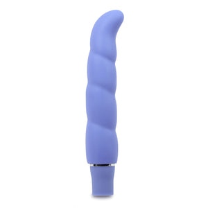 Side view of the blush Logo Purity G periwinkle Vibrator, standing on its base.