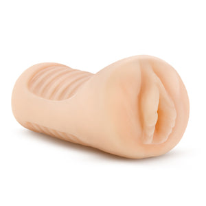 Top side view from the front of the blush M Elite Annabella Soft + Wet Stroker.
