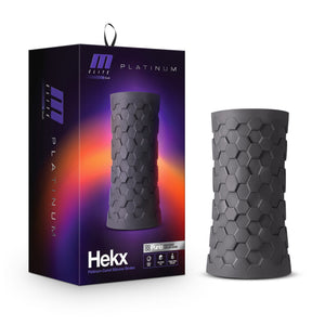 On the left side of the image is the product packaging. On the left side of packaging has the M For Men Platinum logo. On the front of packaging, from the top has the M For Men Platinum logo, an image of the product, product name: Hekx, and product feature icons for: Purio Revolutionary Super-soft Silicone. Beside the packaging is a side view of the bush M For Men Hekx Platinum-Cured Silicone Stroker.