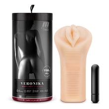 Load image into Gallery viewer, From left side of image is product packaging. On packaging is the M Elite by blush logo, black &amp; white photo of a naked woman from behind, product characteristics: 7 inch length x 2.5 inch width - 14.6 oz. (415 gm) total weight, product name: Veronika Soft + Wet Stroker, product feature icons for: self lubricating; ribbed for pleasure; mini-vibe included; X5+ ultra-soft &amp; squishy, and on bottom &quot;Take a peek&quot;. Beside packaging is the stroker, and beside the stroker is the mini-vibe.
