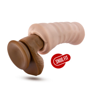 blush M For Men Skye Vibrating Stroker wrapped around a dildo, facing front side, with an icon for Snug Fit.