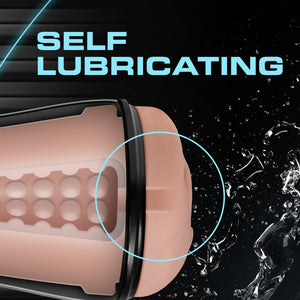 Self Lubricating, with front end of the blush M For Men Soft + Wet Pussy With Pleasure Orbs Self Lubricating Stroker, with water splashes around it, indicating lubrication.
