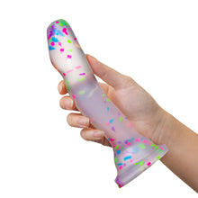Load image into Gallery viewer, blush Neo Elite Hanky Panky 7.5 Inch Silicone Glow In The Dark Dildo being held in a hand, showing the size scale of the product.