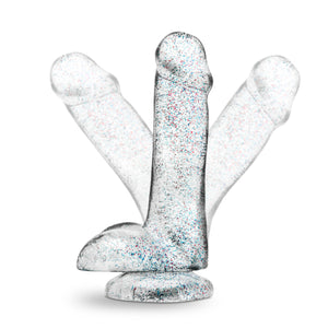 Side view of the blush Naturally Yours 6 Inch Glitter Cock, placed on its suction cup, with a faded illustration of the shaft pointing in two seperate directions, showing the flexibility of the shaft.