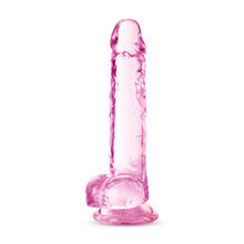 Load image into Gallery viewer, Bottom side view of the blush Naturally Yours 7 Inch Crystalline Dildo, standing on its suction cup base.