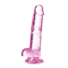 Load image into Gallery viewer, Side view of the blush Naturally Yours 7 Inch Crystalline Dildo, standing on its suction cup base.