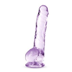 Side view of the blush Naturally Yours 8 Inch Crystalline Dildo, placed on its suction cup base.