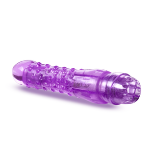 Back side view of the blush Naturally Yours Bumb N' Grind Vibrator