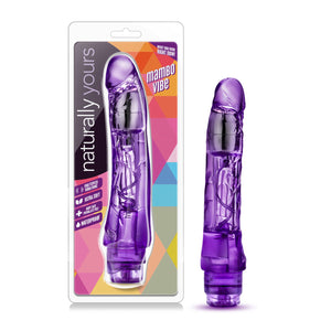 On the left side of the image is the product packaging. On the packaging naturally yours logo, product feature icons for: multispeed vibrations; Ultra soft; Body safe phthalate free; Waterproof, In the middle is the vibrator inside visible through clear packaging, "What you need right now!", and product name: Mambo Vibe. Beside is the product, blush Naturally Yours Mambo Vibe, standing up on its base.