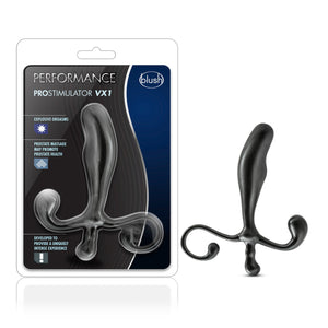 On the left side of the image is the product packaging. On the packaging are the Performance & blush logos, product name: Prostimulator VX1, product feature icons for: Explosive orgasms; Prostate massage may promote prostate health; Developed top provide a uniquely intense experience, and the product inside visible through clear packaging. Beside the packaging is the product blush Performance Prostimulator VX1.