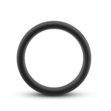 Load image into Gallery viewer, Side view of the blush Performance Silicone Pro black Cock Ring