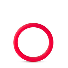 Load image into Gallery viewer, Side view of the blush Performance Silicone Pro red Cock Ring