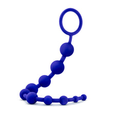 Load image into Gallery viewer, Top side view of the blush Luxe Silicone 10 Beads For Anal Play, lifted at the handle.