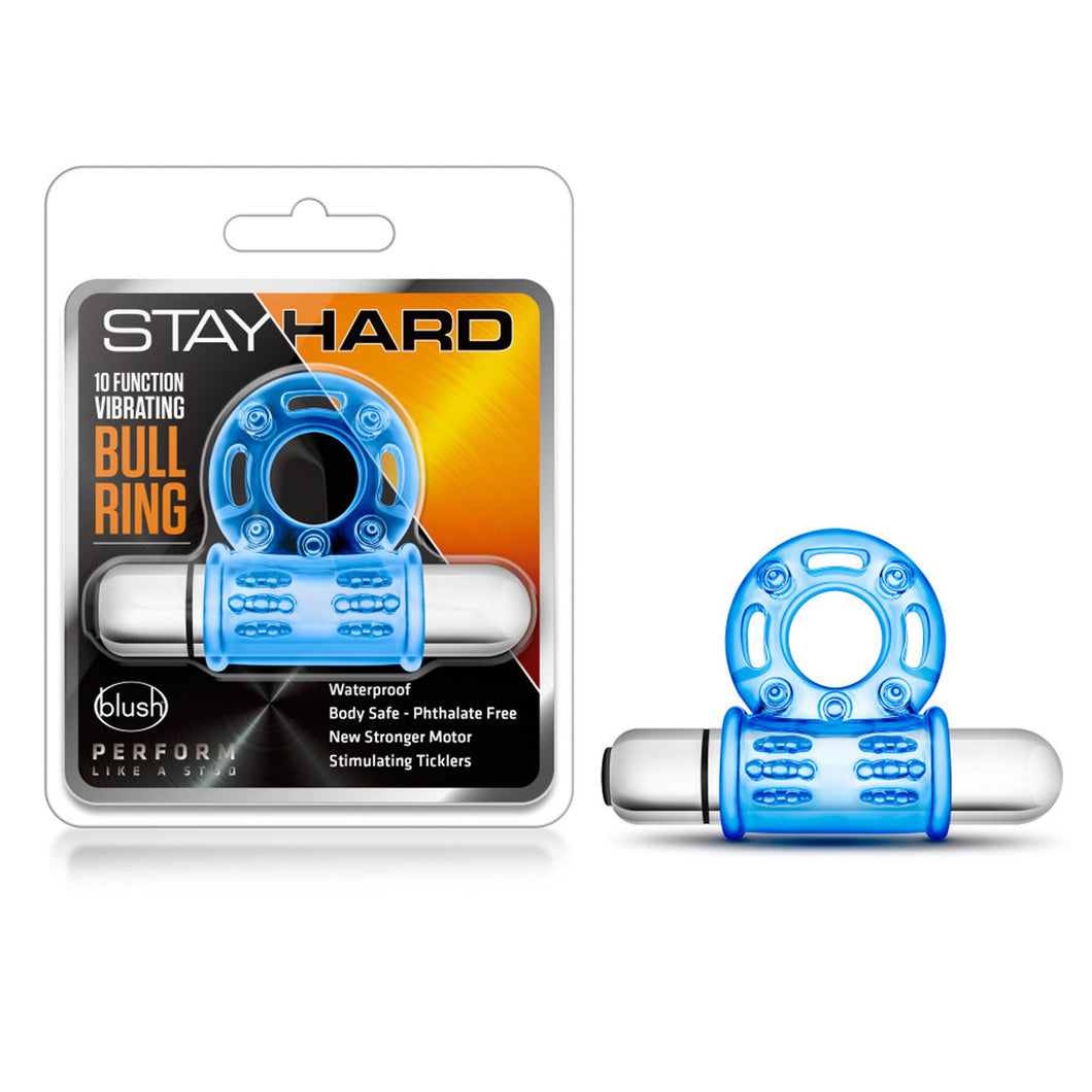 On the left side of the image is the product packaging. On the packaging is the Stay Hard logo, product name: 10 Function Vibrating Bull Ring, in the middle is the product visible through clear packaging, blush logo, the slogan: Perform like a stud, and product features: Waterproof; Body Safe - Phthalate Free; New Stronger Motor; Stimulating Ticklers. Beside the packaging is the product fully assembled.