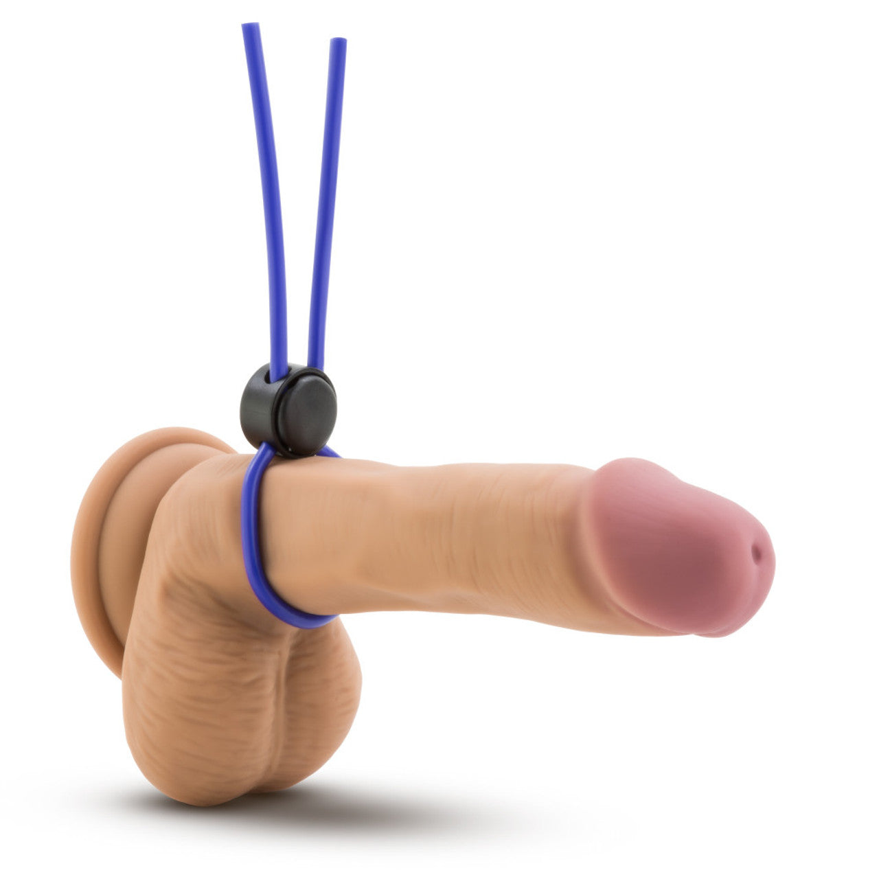 Front side view of a releastic dildo used as a demo to show the placement of the blush Stay Hard Silicone Loop Cock Ring strapped on.