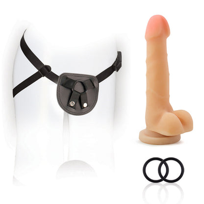 Front of the blush SX For You Harness, on a mannequin, beside is the 7" Cock, and below are the 2 silicone rings.