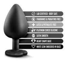 Load image into Gallery viewer, blush Temptasia Bling Plug features: LAB CERTIFIED - BODY SAFE; FRAGRANCE &amp; PARAFFINS FREE; LATEX &amp; PHTHALATE FREE; PLATINUM CURED SILICONE; SATIN SMOOTH; HEART SHAPE BASE; WHITE GEM EMBEDDED IN BASE.