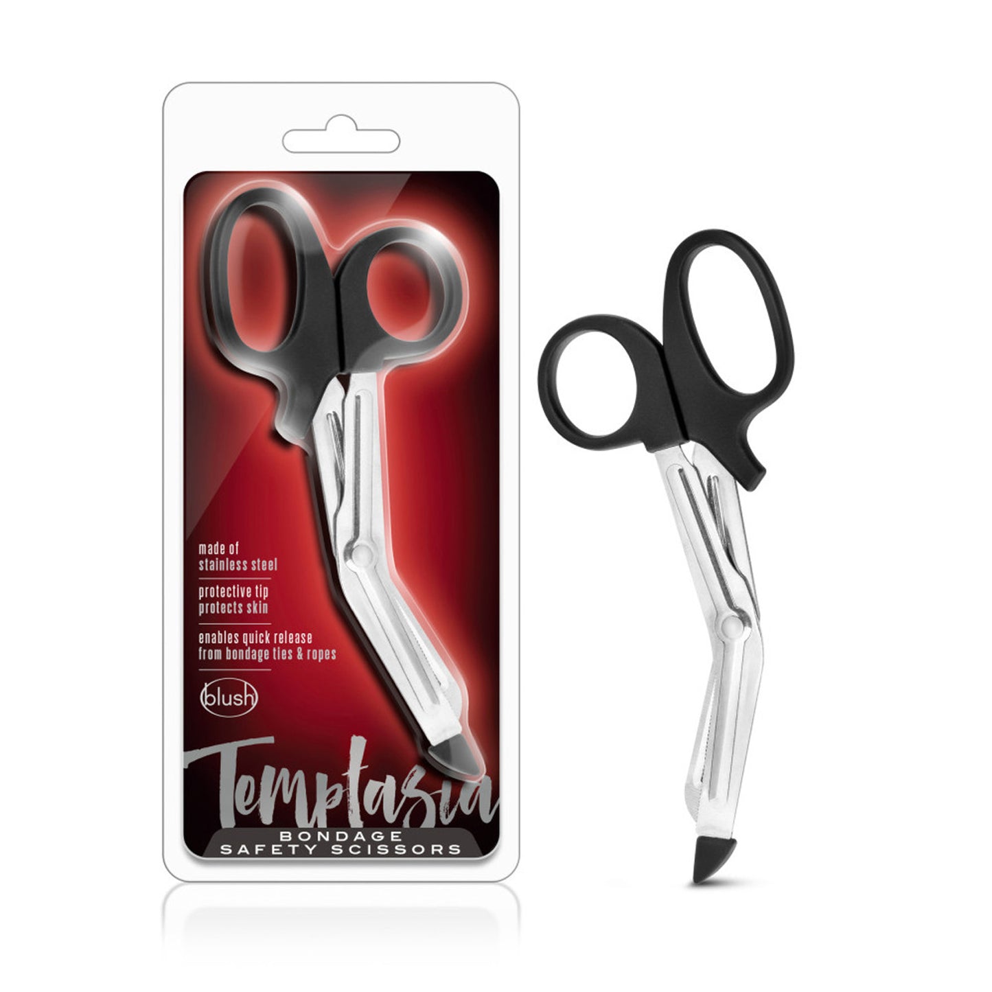 On the left side of the image is the product packaging. On the packaging is the product visible through clear packaging, product features: made of stainless steel; Protective tip protects skin; Enables quick release from bondage ties & ropes, blush & Temptasia logos below, product name: Bondage Safety Scissors. Beside the packaging is the product standing on its tip.