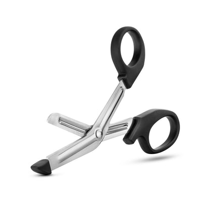 Front side of the opened blush Temptasia Bondage Safety Scissors