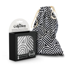 Load image into Gallery viewer, On the left side of the image is the packaging for the Bomba variant blush The Collection Cotton Toy Bag. On the package shows The Collection by blush logo &quot;Beautiful Designs to Safely Store Your Favorite Toys, Cinch to Close and Ensure Toy Remains Clean and Discreet&quot;, the pattern of the variant visible through clear packaging, product feature icons for: 100% cotton &amp; lint free; Storage size 7.5&quot; x 12.25&quot;, and the blush logo on the bottom right. Beside the packaging is the Bomba toy bag standing up.