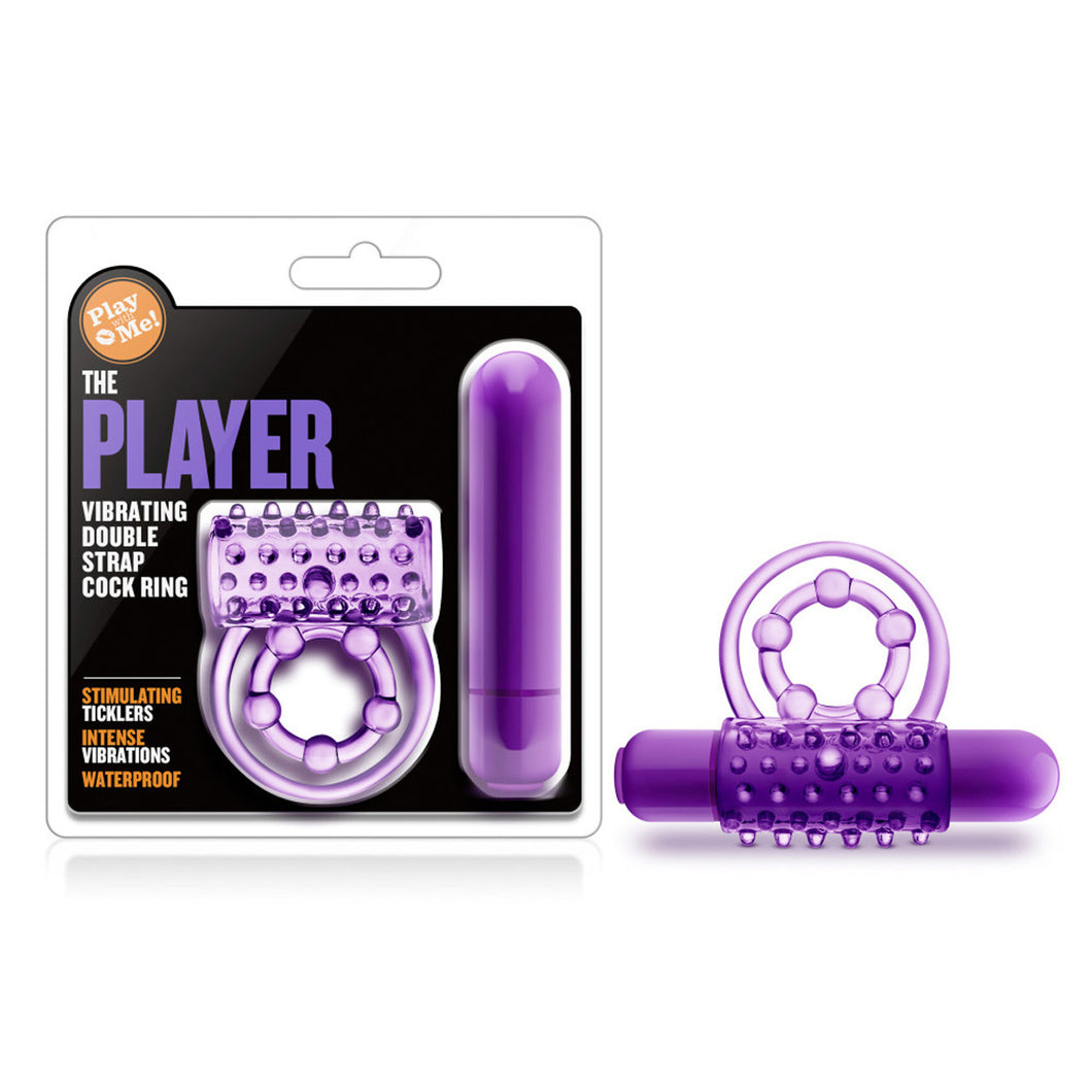 On the left side of the image is the product packaging. On the packaging is the Play with me logo, product name: The Player Vibrating Double strap Cock Ring, Product features: Stimulating ticklers; Intense vibrations; Waterproof, and the Cock ring with the bullet is visible through clear packaging. Beside the packaging is the product laying on the ticklers.