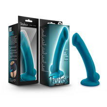 Load image into Gallery viewer, From left of image are 2 packaging boxes: 1st is facing back showing left side &quot;Nice curves&quot;, and a photo of a female waist wearing the dildo; back showing Temptasia logo, Product name: Reina, and the product visible through packaging. 2nd box facing front shows image of product, product features: Made fo pure silicone; satin smooth; Suction cup base; Harness compatible; Body safe phthalate free, Temptasia logo, and product name: Reina. Beside packaging boxes is the dildo, standing on its suction cup base.