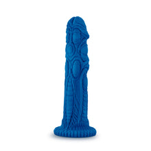 Load image into Gallery viewer, Bottom side view of the blush The Realm Draken Snap On Dildo, standing on its suction cup.