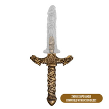 Charger l&#39;image dans la galerie, front of the blush The Realm Drago Sword Lock On Handle, and a clear dildo attached at the top, showing how the sword would extend. In the bottom right caption text: SWORD-SHAPE HANDLE COMPATIBLE WITH LOCK ON DILDOS.