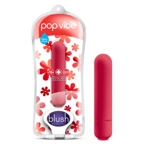 On the left side of the image is the red product packaging. On the packaging is the product name: pop vibe, product feature icons for: Waterproof; 10 vibrating functions; Phthalate free - Body safe; Smooth satin finish, the red vibe visible through the packaging, and the blush logo in the bottom. Beside the packaging is the red product variant standing on its base.