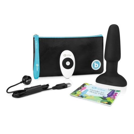 Image showing everything packaged with the b-Vibe Rimming Plug 2 including: Discreet travel bag; Wireless remote controller; Charging cable; b-Vibe Guide to Anal Play.