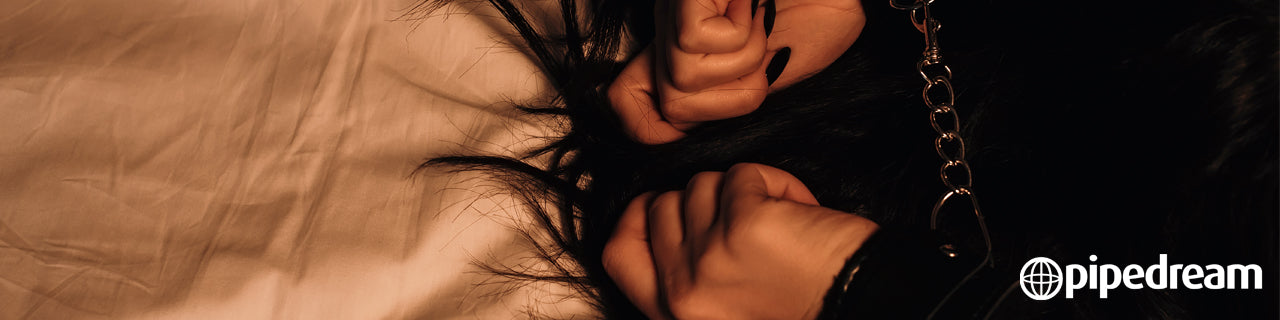 Banner for Pipedream, with a background image of a closeup on hands that are handcuffed together.