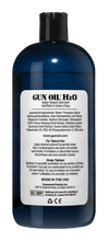 Load image into Gallery viewer, Back label of the Gun Oil H2O 32 oz / 960 mL bottle: GUN OIL: H20 water-based lubricant. Ingredients/Ingrédients: Water, Propylene Glycol, Hydrangethylcellulose, Aloe Barbadensis Leaf Extract Potassium Sorbate, Sodium Benzoate, Tetrasodium EDTA, Panax Ginseng Root Extract, Paulinia Cupana (Guarana) Seed Extract, Avena Sativa (Oat) Extract, Polysorbate-20, PEG-45, Polyquarterium-5, Citric Acid. www.gunoil.com For Topical Use Apply desired amount to genital areas.