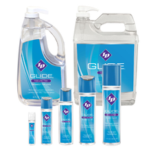 Load image into Gallery viewer, ID Glide Water Based Lubricants. In the back row are the 1900 millilitres / 64 ounce and 3.8 litre / 1 gallon jugs. In the front row are the 30 millilitres / 1 ounce, 65 millilitres / 2.2 ounce, 130 millilitres / 4.4 ounce, 250 millilitres / 8.5 ounce, and 500 millilitres / 17 ounce bottles.