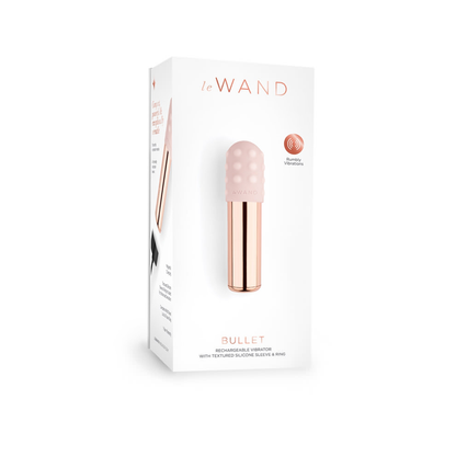 On the front of the packaging shows Le Wand logo, an image of the product, product feature icon or Rumbly vibration, and the product name at the bottom for Bullet Rechargeable Vibrator with Textures Silicone Sleeve & Ring