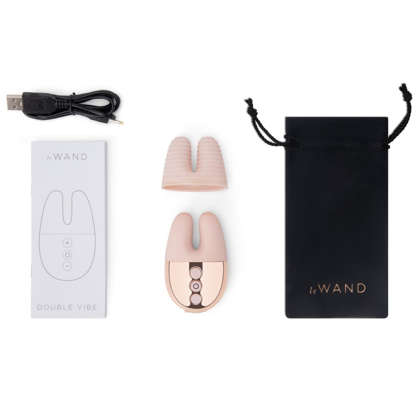 All the included components included: Le Wand Double Vibe, USB charging cable, additional textured sleeve, and discreet storage bag.