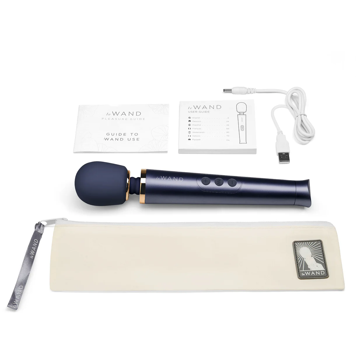 Included components with Le Wand Petite Navy Massager, Le Wand Guide to wand use, Le Wand User Manual, USB charging cable, Le Wand storage bag.