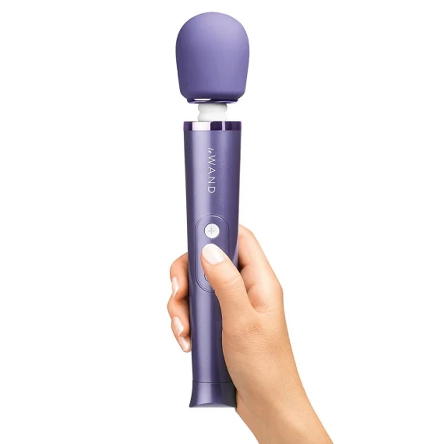 Le Wand Petite Violet Massager being held showing the size scale of the product compared to a human hand