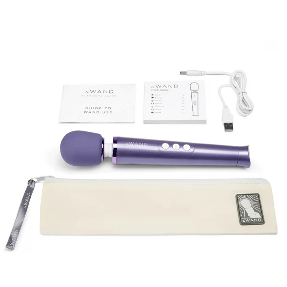 Included components with the Le Wand Petite Violet Massager, Le Wand Guide to Wand Use, Le Wand User Manual, USB charging cable, Le Wand storage bag.