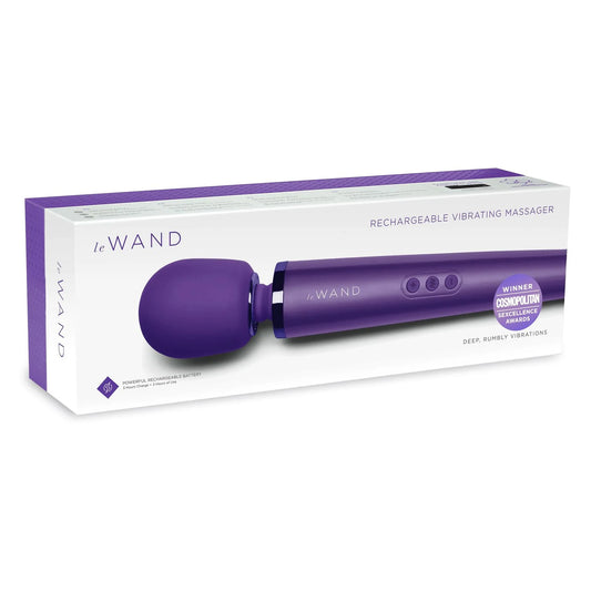 On the front of the packaging shows Le Wand logo, product name: Rechargeable Vibrating Massager, an image of the purple variant of the product, Winner cosmopolitan Sexcelence Awards, and product features: Deep, rumbly vibrations; Powerful rechargeable battery 3 hours charge = 3 hours of use.