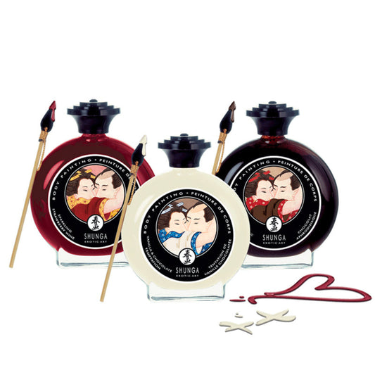 A trio of Shunga Erotic Art edible body painting jars in Sparkling Strawberry Wine, Vanilla & Chocolate Temptation, and Aphrodisiac Chocolate flavours, each featuring traditional Japanese shunga artwork and an included application brush.