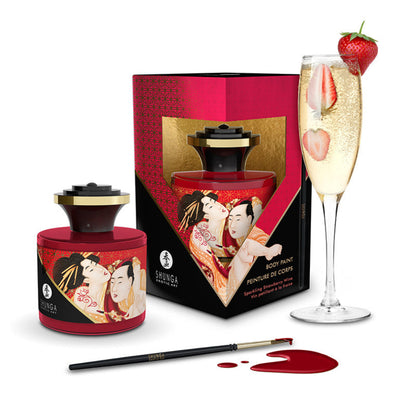 Shunga Sparkling Strawberry Wine 50 ml / 1.7 oz body paint bottle, traditional geisha gift box, applicator brush, and champagne flute with strawberries.