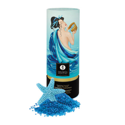 SHUNGA Ocean Temptations blue bath salt canister with a pile of blue crystals and a decorative blue starfish.