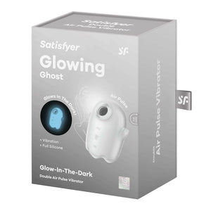 On the front of the product packaging are the Satisfyer logos, product name: Glowing Ghost, "Glows in the dark" with a circular image of the product glowing in the dark, on the right side is the image of the product with "Air Pulse" written above, product feautres: Vibration; Full Silicone, on the bottom "Glow-In-The-Dark Double Air Pulse Vibrator. On the right side of packaging "Double Air Pulse Vibrator" written across, and the "SF" logo sticking out from the side.