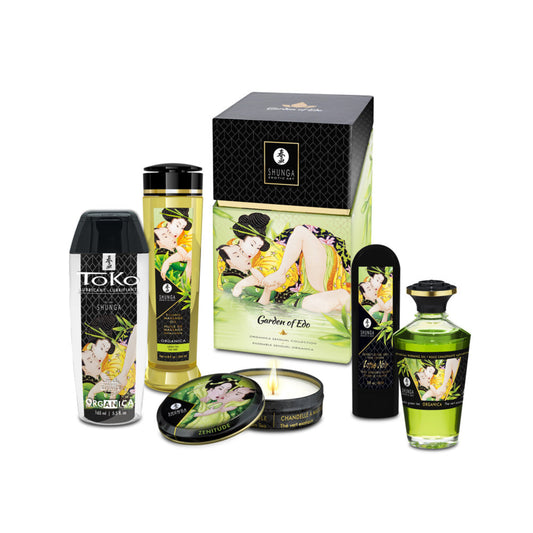 The SHUNGA Garden of Edo Organica Sensual Collection, a luxury gift set featuring five full-size natural intimate products: TOKO personal lubricant, kissable massage oil, a lit massage candle, sensitizing gel, and aphrodisiac warming oil, all displayed with their ornate Japanese Shunga erotic art packaging.