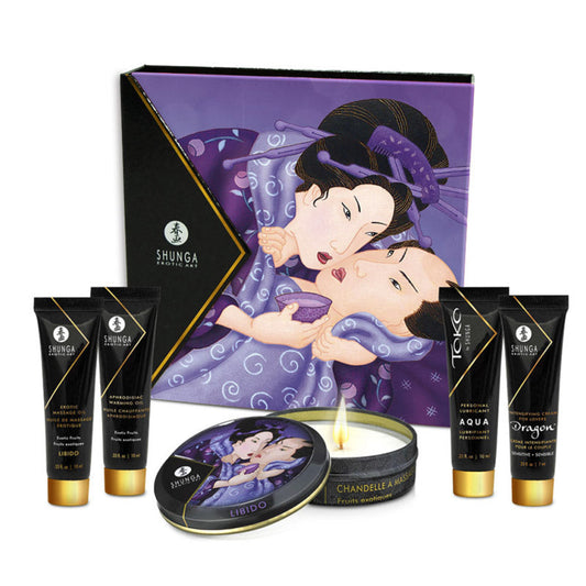 A SHUNGA Geisha's Secret gift set displayed with its purple art-adorned box and five mini-sized sexual wellness products, including oils, lubricant, and a massage candle.